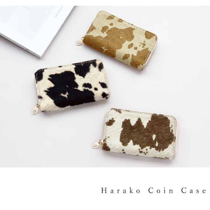 【財布の百貨店公式】 美しい毛並みとやわらかな手触りのコインケース 大人のハラコ風 本革 ラウンドファスナー コンパクト 小物入れ 牛革 小銭入れ うし柄 牛柄 【安心の返品保証付き】