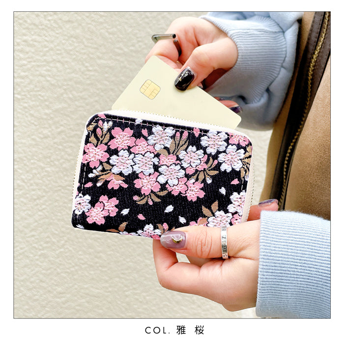 【財布の百貨店公式】 西陣織 宵 ミニ財布 財布 金襴 ミニウォレット コンパクト ラウンドファスナー サイフ さいふ ウォレット 小さい財布 カード収納 ラウンド財布 ミニサイフ 和風 和柄 和 豪華 織物 桜 波割付 変わりのし文 ハンドメイド 【安心の返品保証付き】